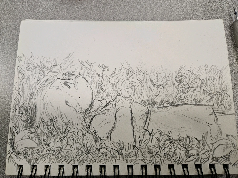 Pencil sketch of woman, angled at her side view, laying on her back on a bed of flowers and foliage
