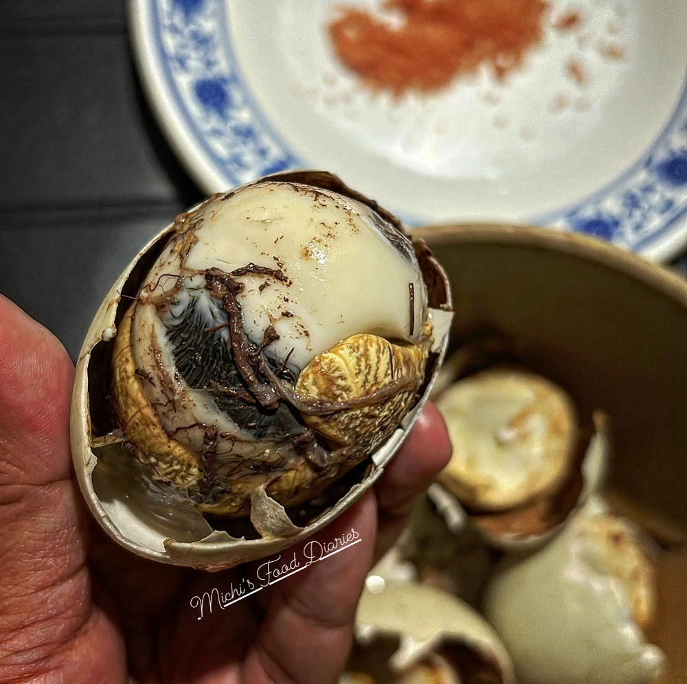 Balut(fertilized duck embryo)- one of the popular street food in the Philippines. Boiled and can b eaten in its opened shell.