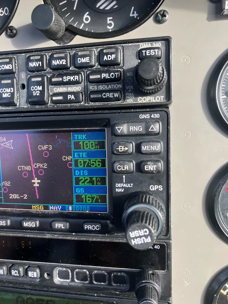 An image of a GPS, showing a plane travelling 167 nautical miles per hour (roughly 310km/h) over the ground.