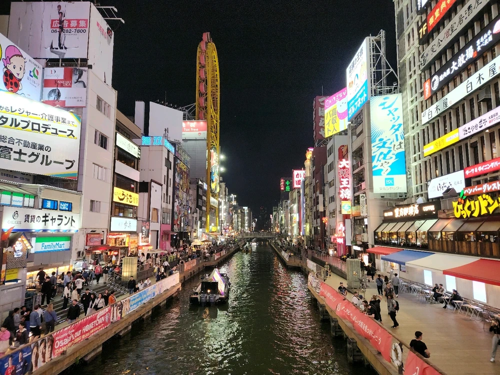 View of the river passing through Dotonburi area of Osaka.
