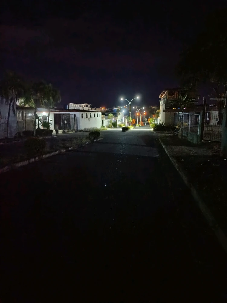 Empty street at the light of the night 