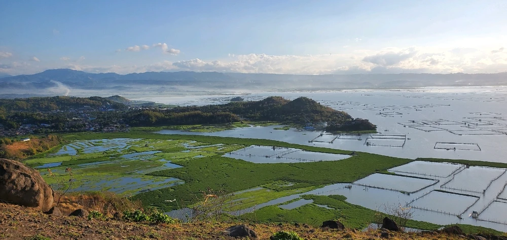 Overlooking of a lake in Rizal. Sunrise right before paragliding