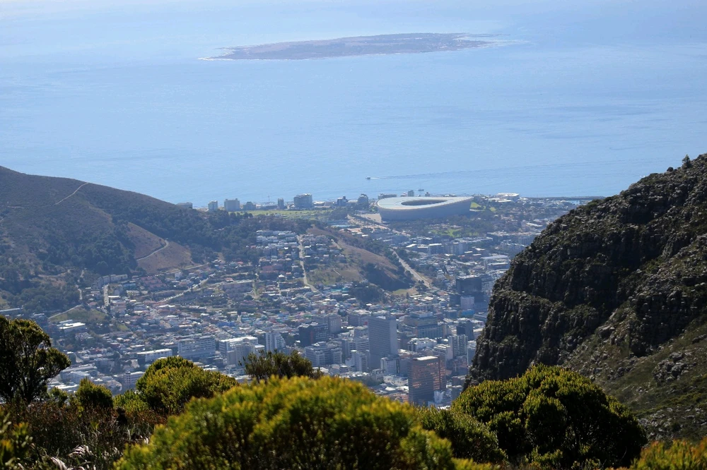 View of Green Point, Cape Town with Robin Island in the distance. Taken near The Saddle on Devils Peak. 