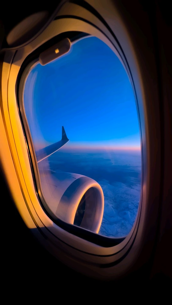 Happiness is looking down on your next destination from your plane window." — Unknown