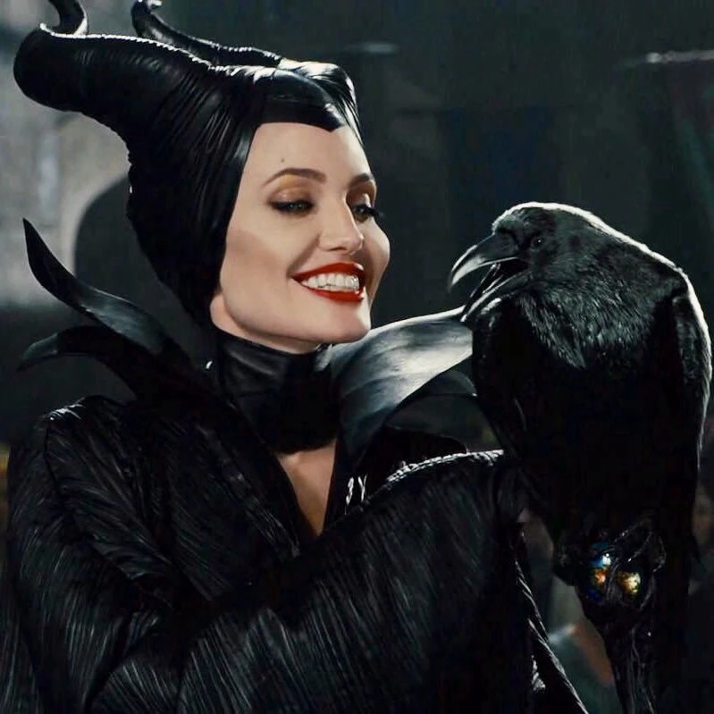 Angelina Jolie as Maleificent and her Crow from the Disney movie Maleficent. 