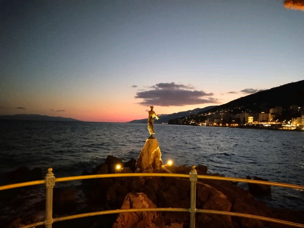 Opatija evening story... Blended sun sea and statue 