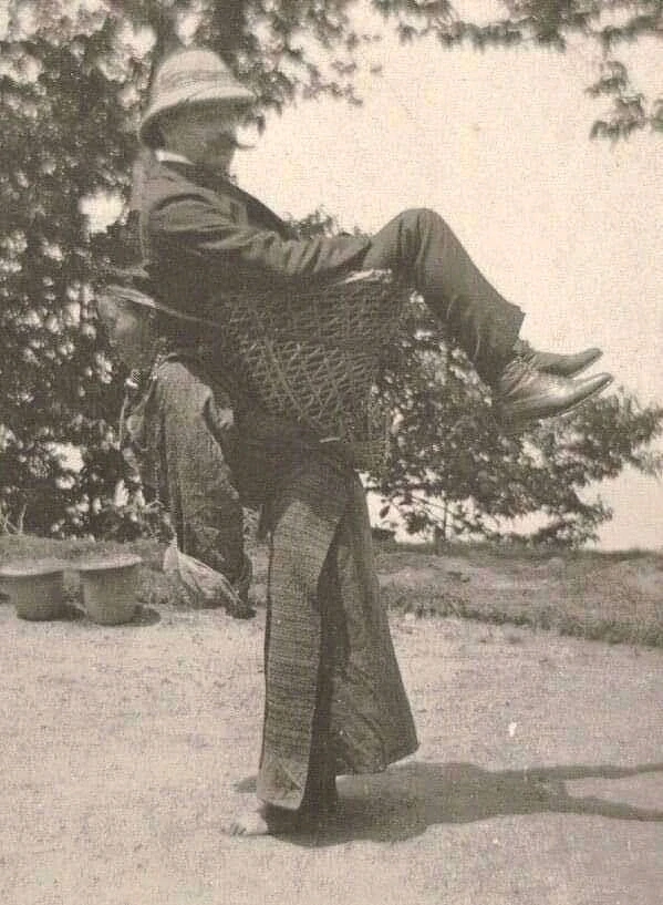 "India, 1900, barefoot woman carrying an Englishman. All colonialism in one photo. 