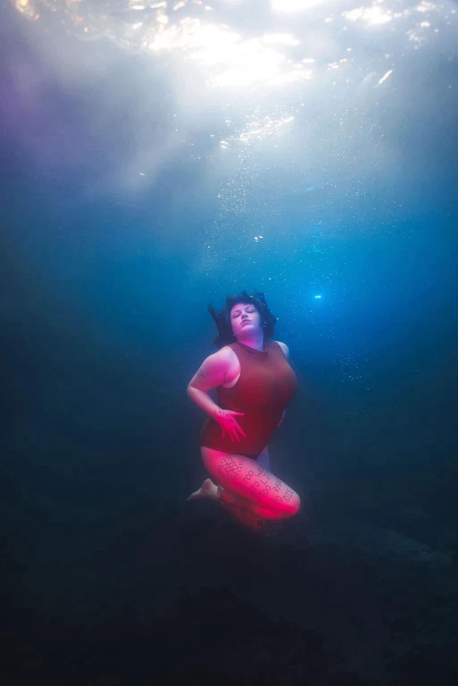 Female Model poses underwater