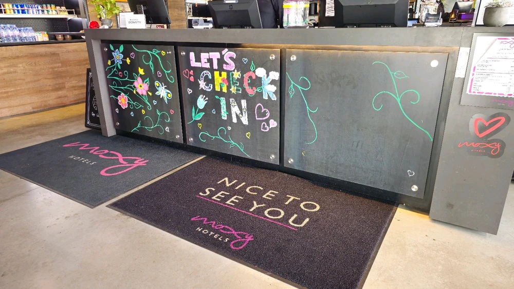 Check in at the bar at the Moxy