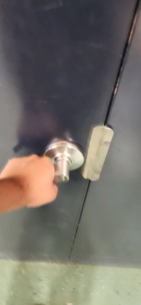 Violently trying to open the door
