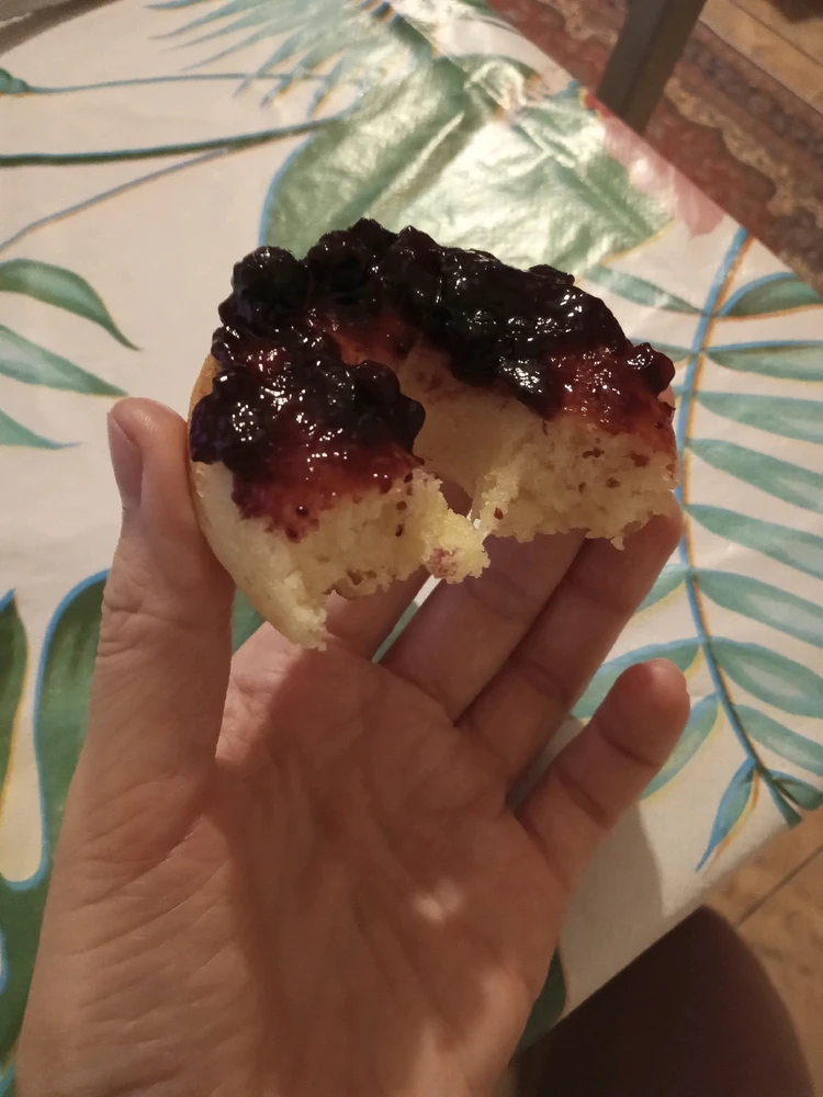 Vegan lemon donuts with blueberry jam on top 🤌