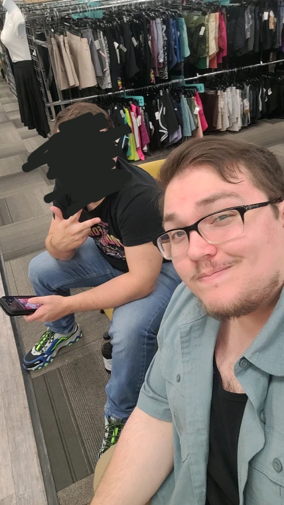 My friend and I waiting to judge another friend's outfits at Plato's Closet