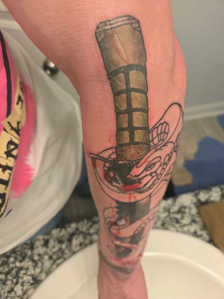 Two headed snake wrapped around M9 Bayonet. Not fully colored. Will update.