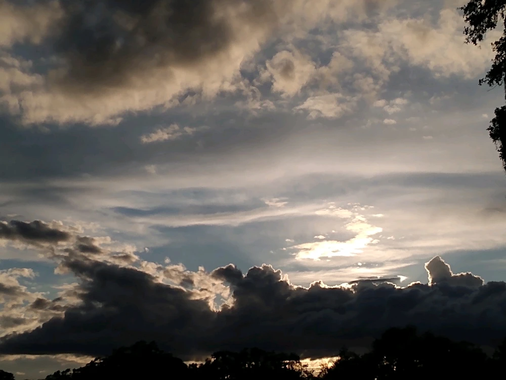 Took this after a walk,, pretty clouds!! :3 