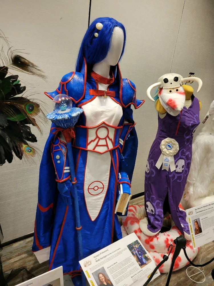 A mannequin wearing a pokémon outfit, The outfit is designed as one of the legendary water pokémon