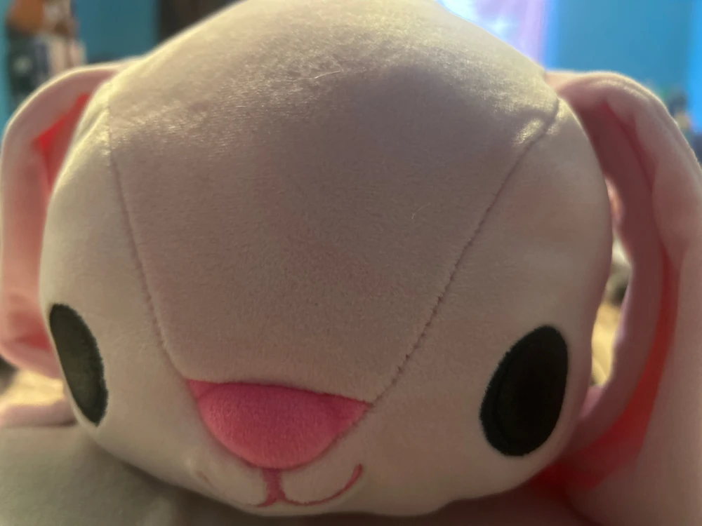Chilling in bed with a weighted plushie on me.