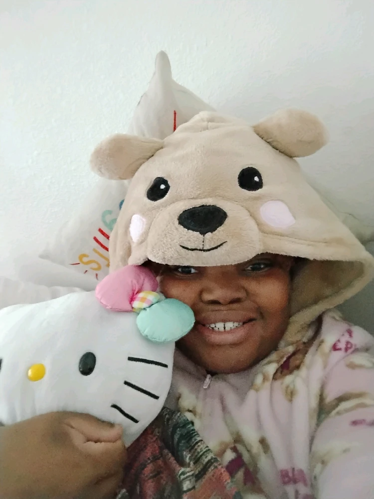 How can you hate me when I'm literally in my bed watching YouTube with my Hello Kitty plushie like this?