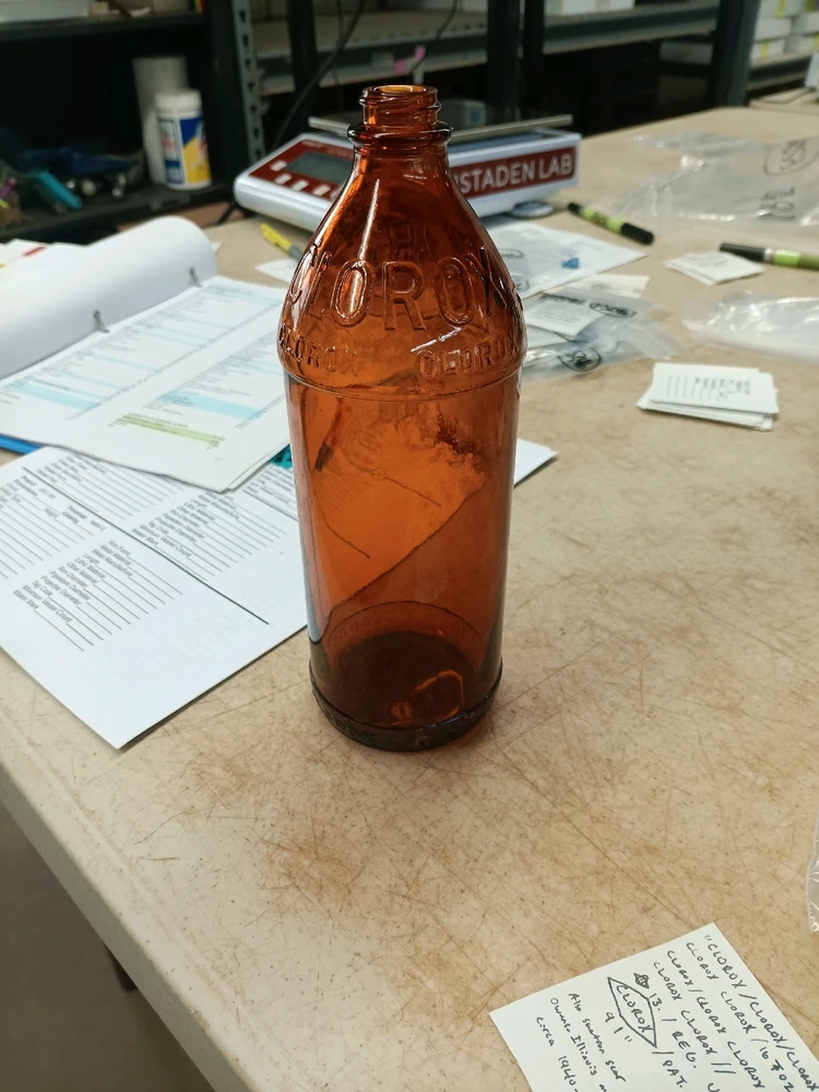 A glass clorox bottle dated to 1940-1942