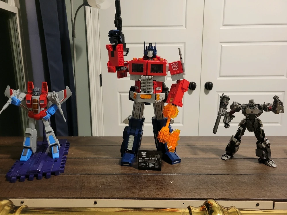 Lego Optimus Prime, Masterpiece Starscream, and Studio Series Bumblebee Movie Megatron 
