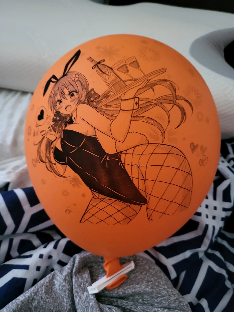 Cute orange balloon with anime print!