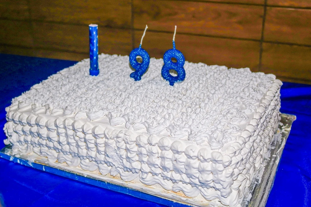 Celebrating my grandpa's b'day with homemade cake. My little cousin baked it.