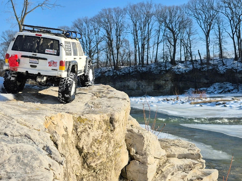 1/10th scale 2001 Jeep Cherokee parked on a rocky outcrop overlooking the Sandusky river