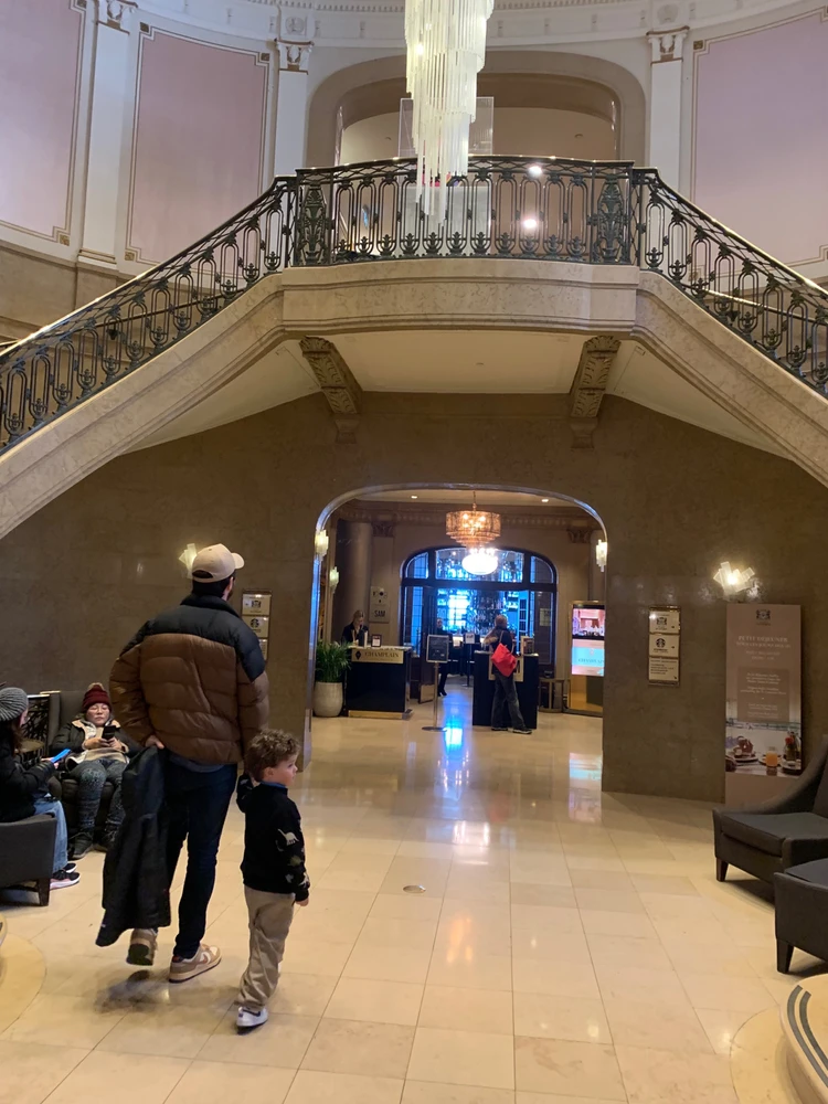 I wish I took a better photo this hallway staircase and chandelier was magical! 