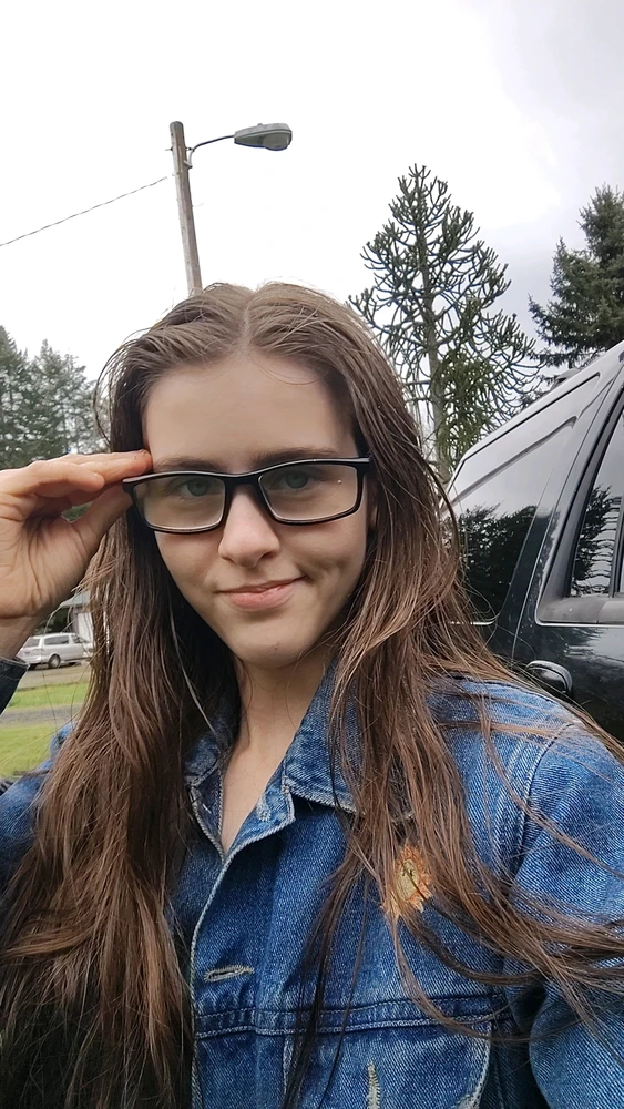 I tried on my mom's glasses and I look pretty cool