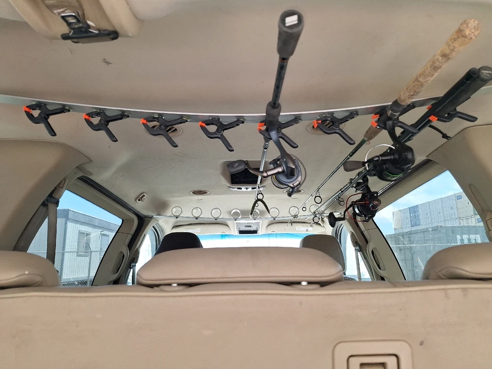 Custom vehicle fishing rod holder