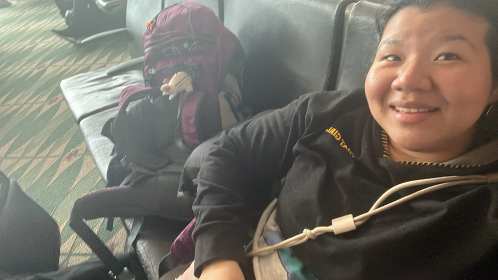 I was tired but happy after a long layover. 🥹