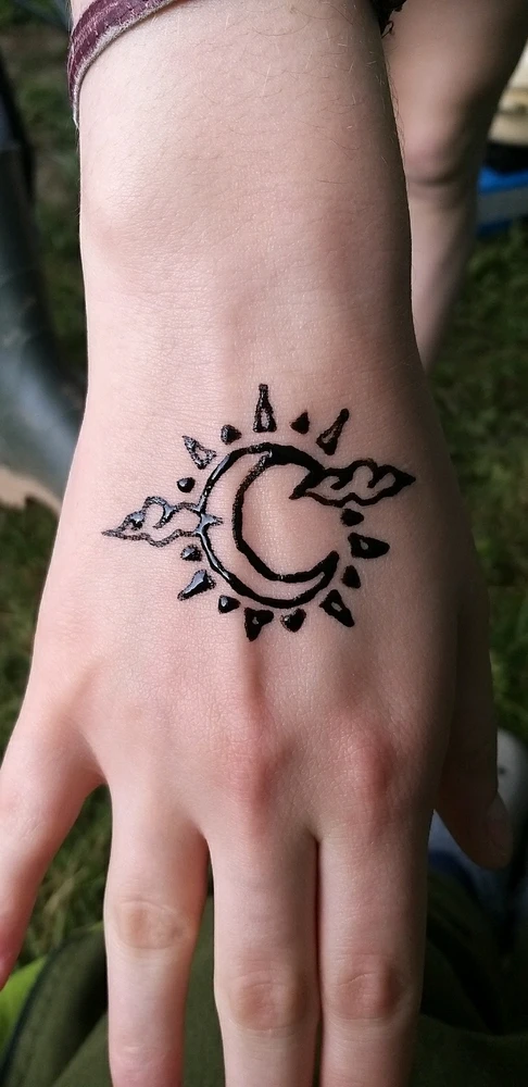 sun x moon combined henna tattoo I made for a friend last year