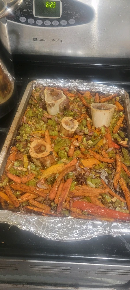 Blanched beef bones with marrow and veggies, roasted.