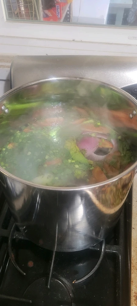 Veggie scraps, herbs, sliced tomatoes.