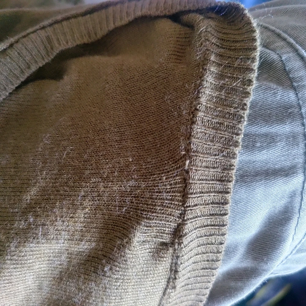 I'm not very good at sewing but I am pretty decent at mending stuff. Before and after.