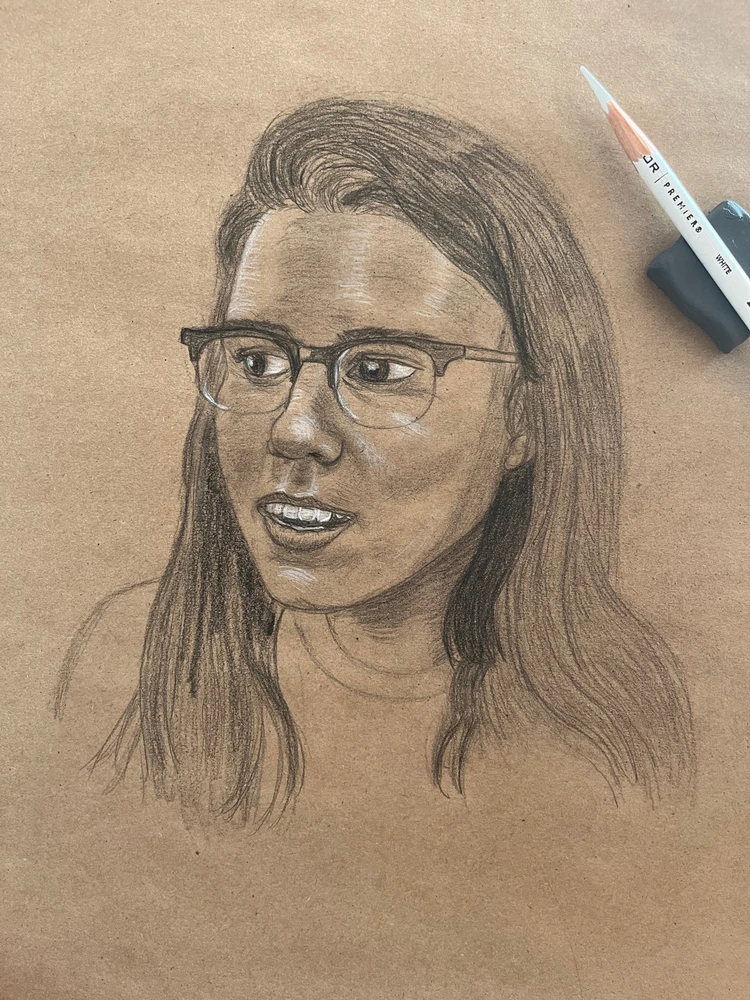 I drew a portrait of YouTuber Angela Colier, an astrophysicist who makes dryly sarcastic videos. Black+white on brown paper