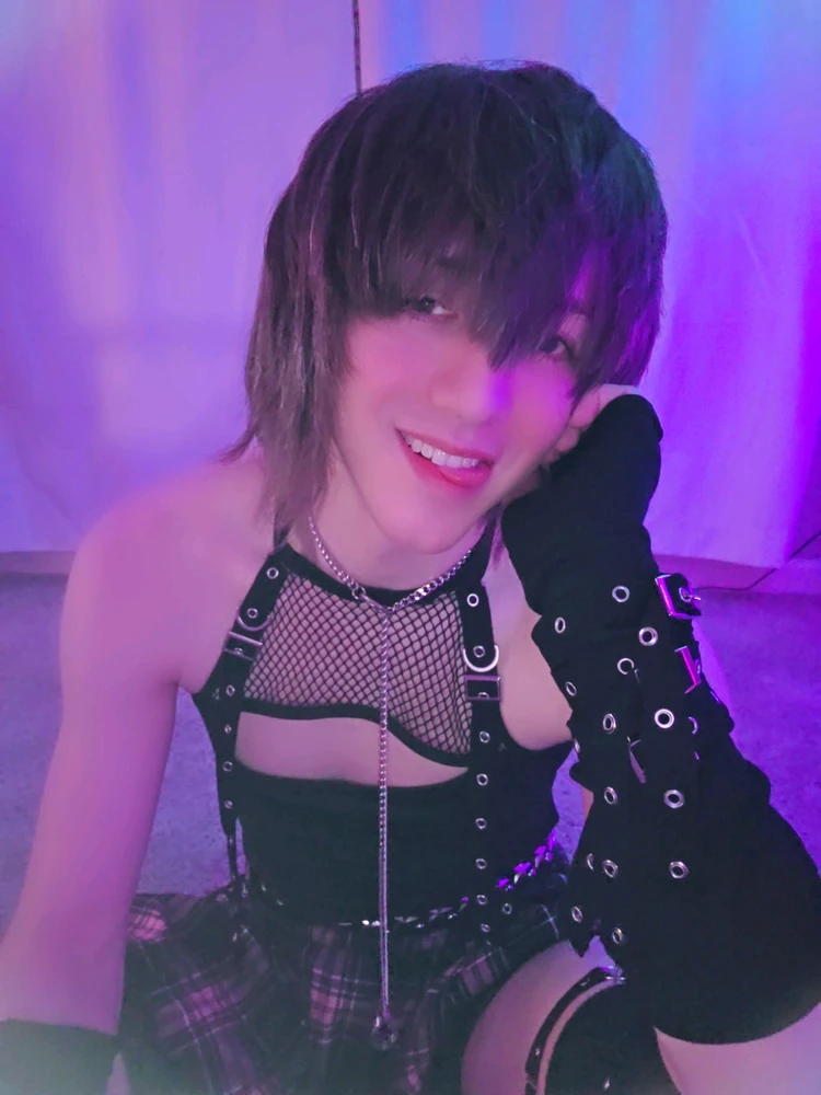 Cute goth femboy bleps at you