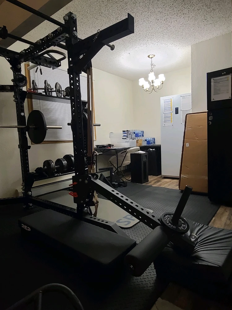 Jammer arms set up for standing weighted leg curls
