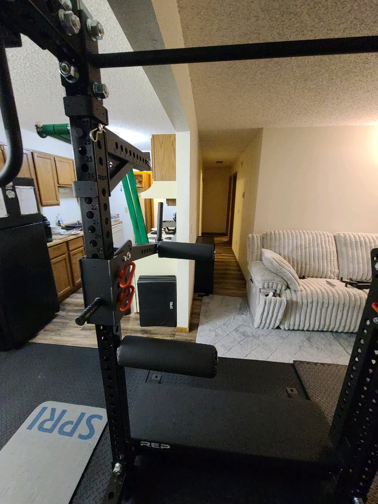 Jammer arms set up for sitting leg curls with resistance bands