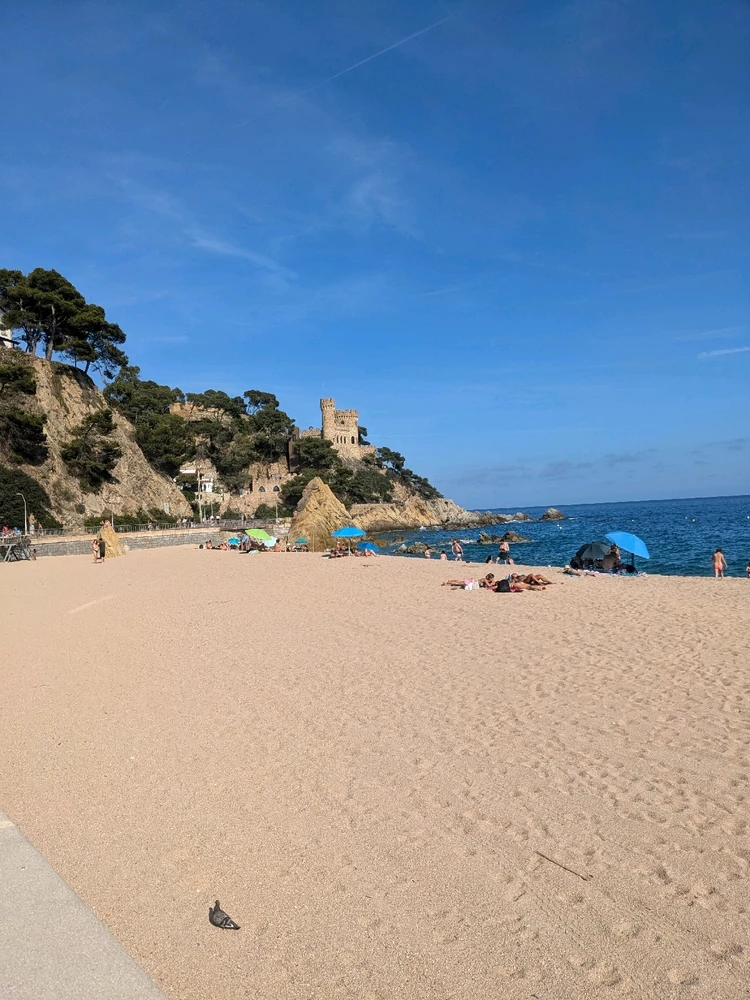 On the beach Lloret de Mar. It was my favorite of the beaches just because there were small stones instead of sticking sand.