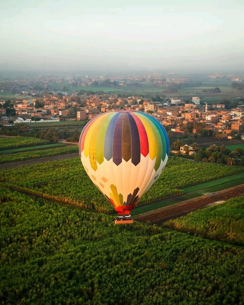 Flying balloon over the countryside