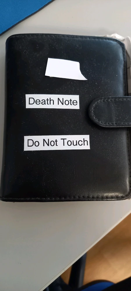 Notizbuch bei der Arbeit