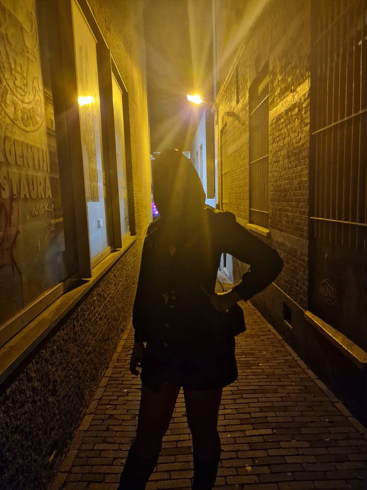 You encounter me in an alley
