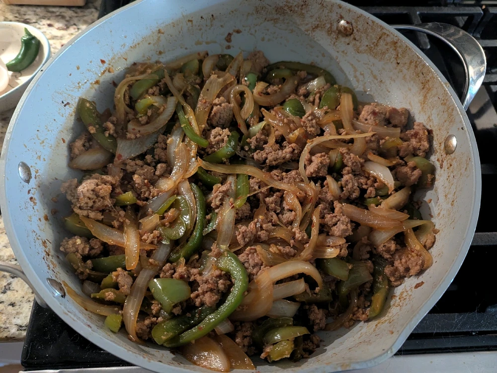 Return veg, sauce, and meat to the pan