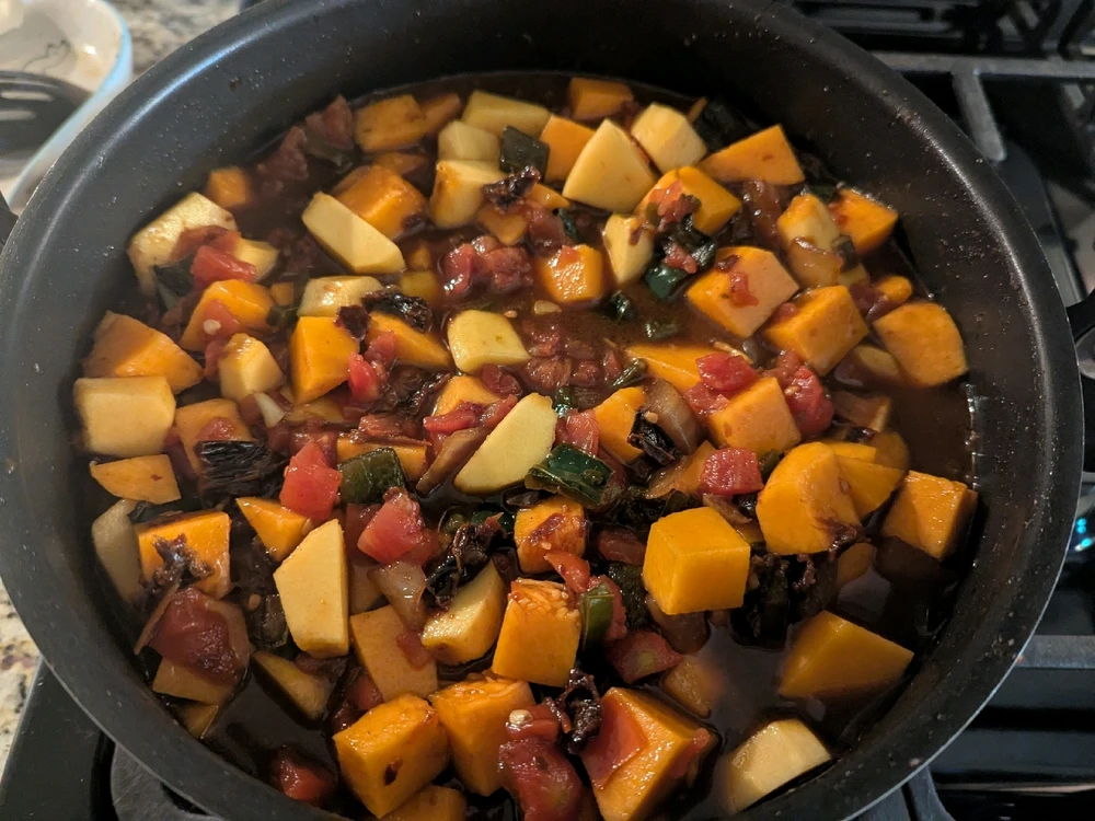 Now it simmers until the winter squashes are soft