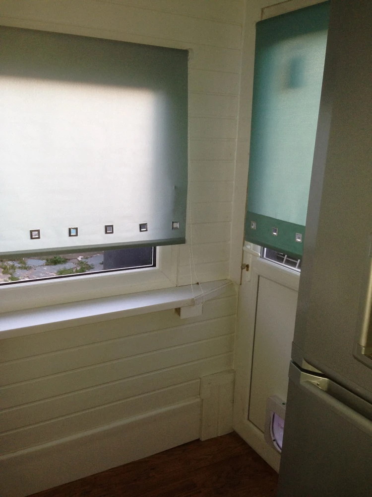 Plastic cladding half the kitchen 