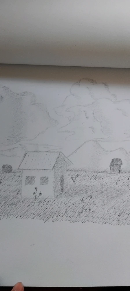 A sketch of a house and huts in the background with grass flowing in the wind and flowers dancing along with it.