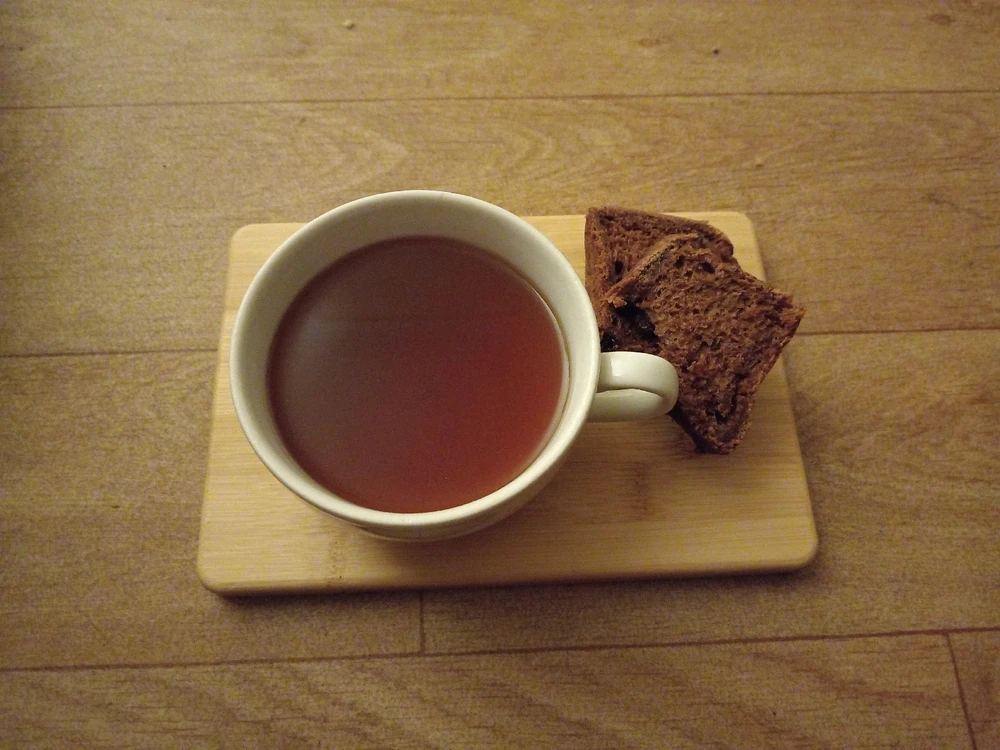 Honey and Rum herbal toddy with malt loaf.