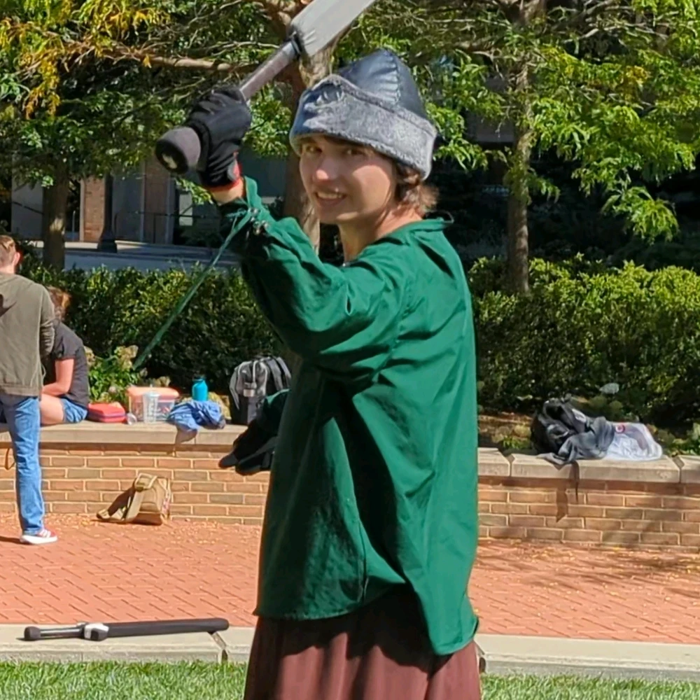 Me at a tournament event in my Turkish cap