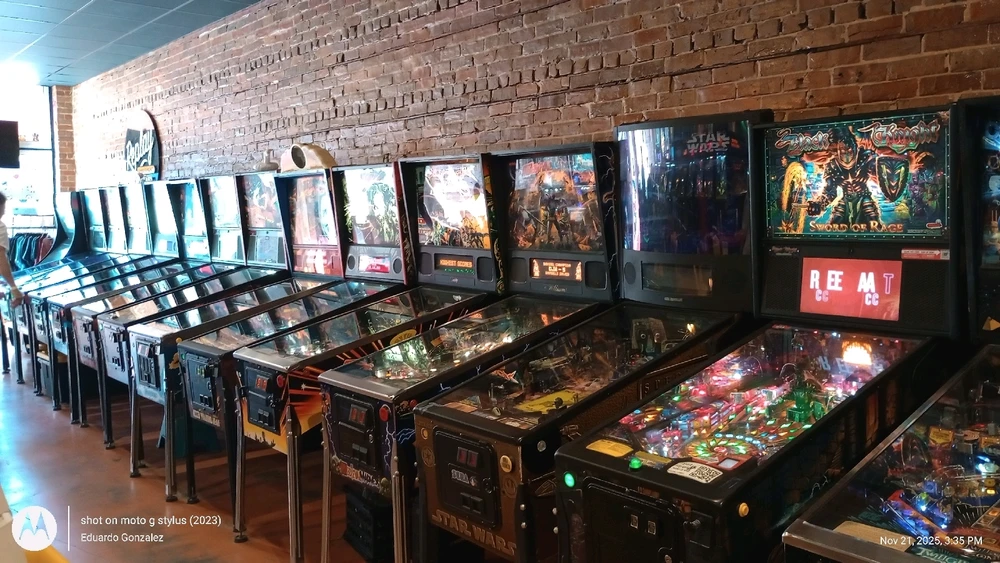 Another row of Pinball machines. Star Wars pinball, on the far right, is out of service.