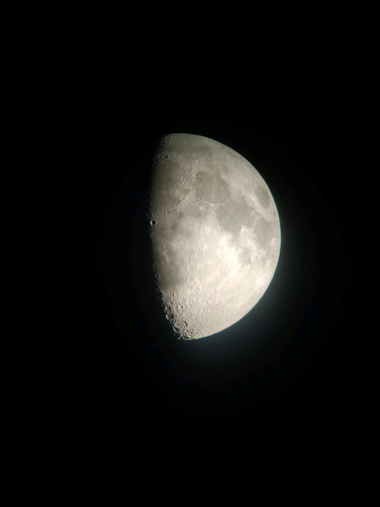 A quarter moon graces the sky: breathtaking, relentless, and a gentle reminder that even beauty can interfere with starlight.